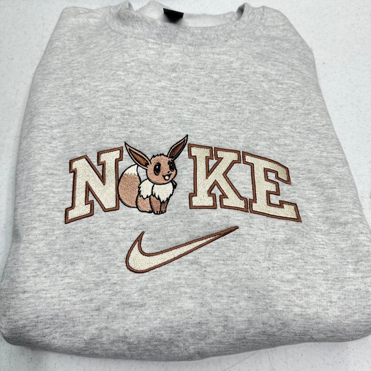 Nike Pokemon Eevee Embroidered Adult Unisex Crewneck Sweatshirt