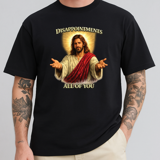 man wearing black tshirt with funny jesus graphic that says disappointments all of you