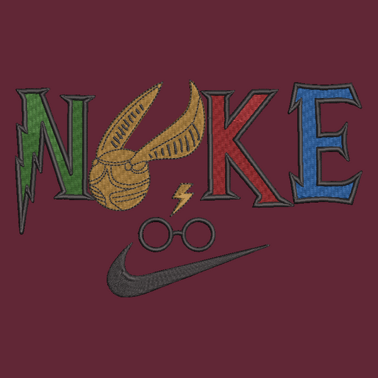 embroidered design of harry potter theme on a maroon background