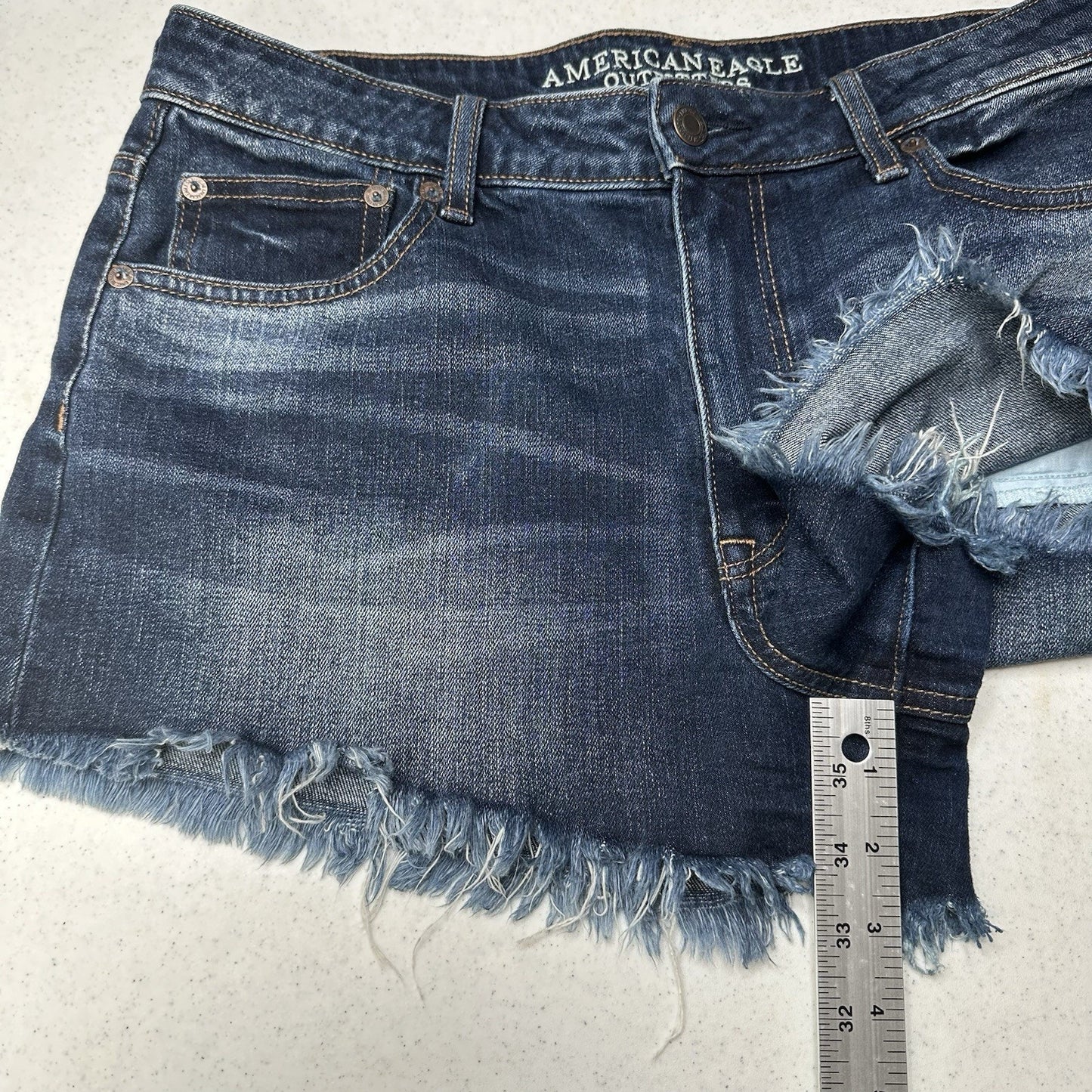 American Eagle Shorts 12 Vintage Hi Rise Festival Shortie Blue Denim Fringe Fray