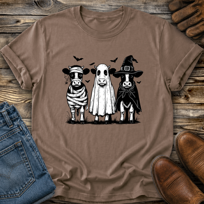 brown tshirt with funny graphic of 3 cow dressed up in halloween costumes