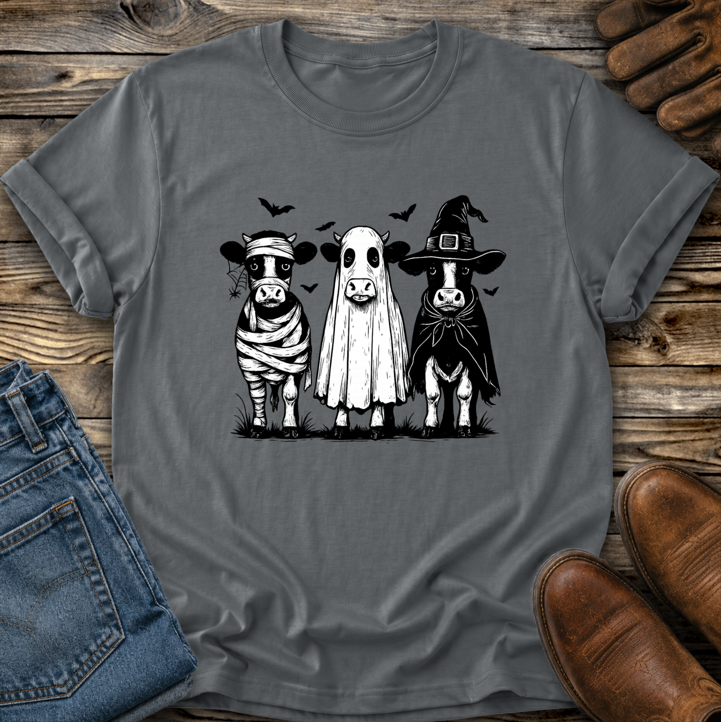 gray tshirt with funny graphic of 3 cow dressed up in halloween costumes