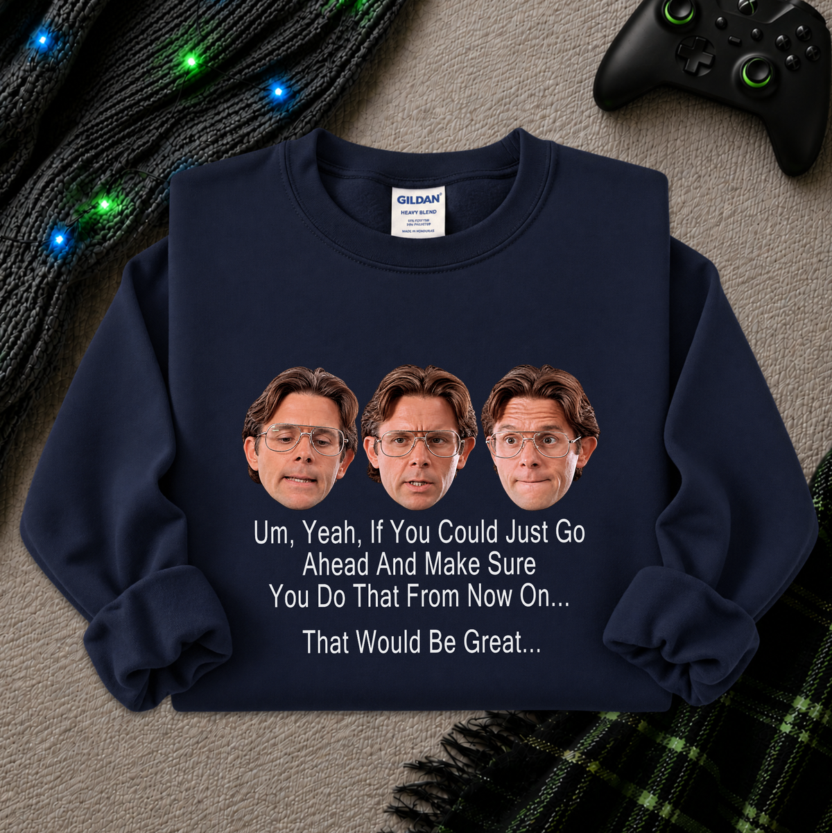 A navy blue crewneck sweatshirt with a graphic of three Jim Halpert headshots and the text 'Um, Yeah, If You Could Just Go Ahead And Make Sure You Do That From Now On.