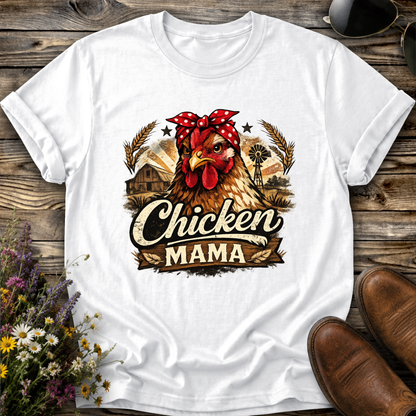 white tshirt with a country farm scene and  a chicken with a bandana on and it says chicken mama