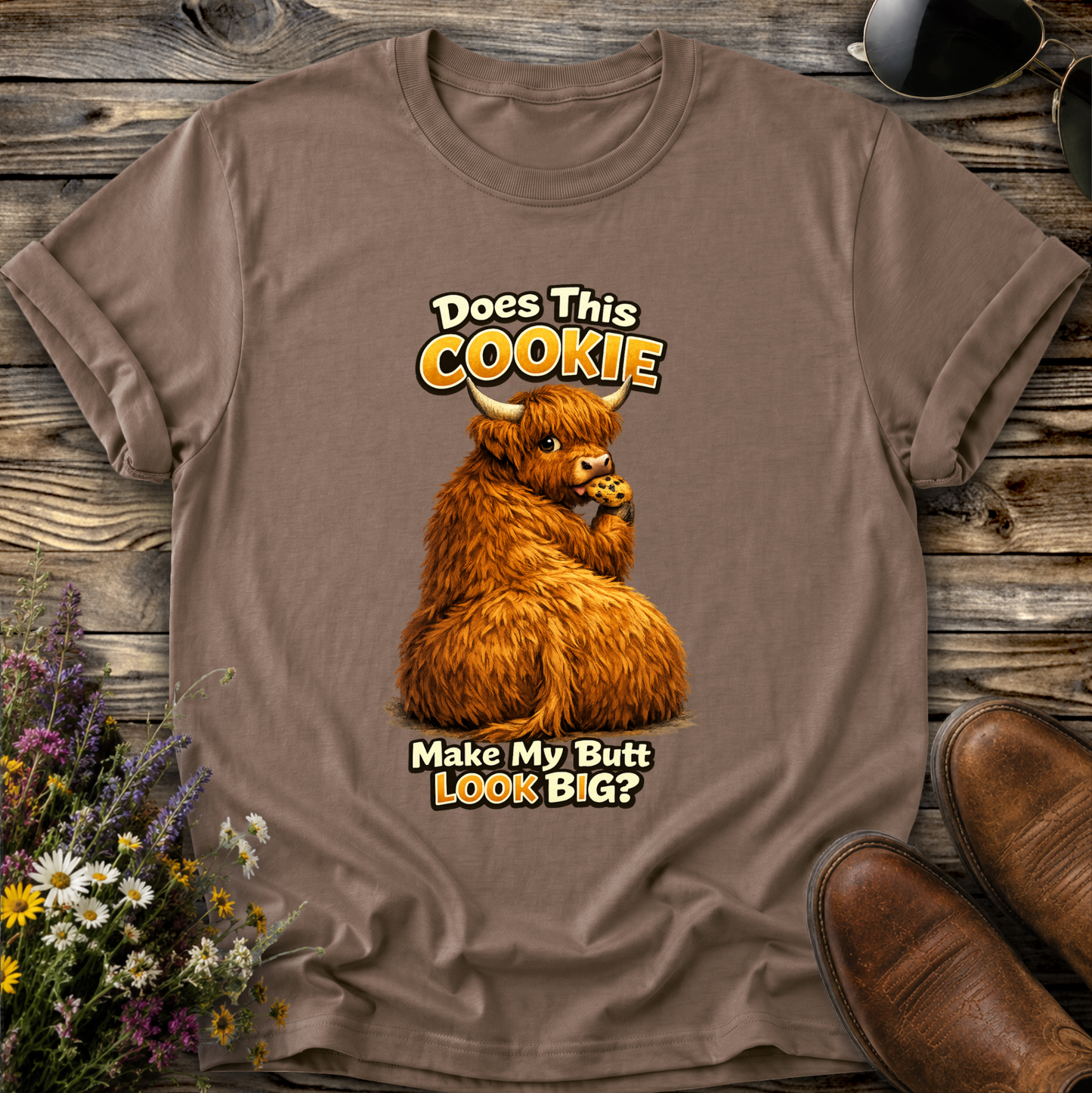 brown tshirt with funny highland cow graphic design that says does this cookie make my butt look big