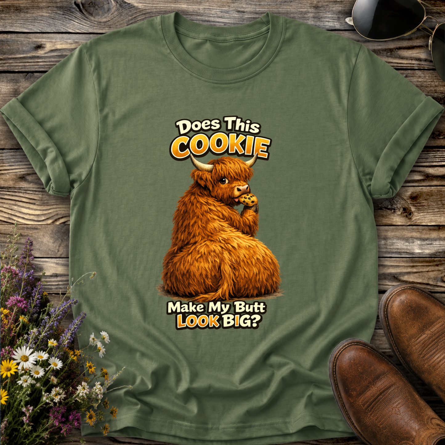 green tshirt with funny highland cow graphic design that says does this cookie make my butt look big