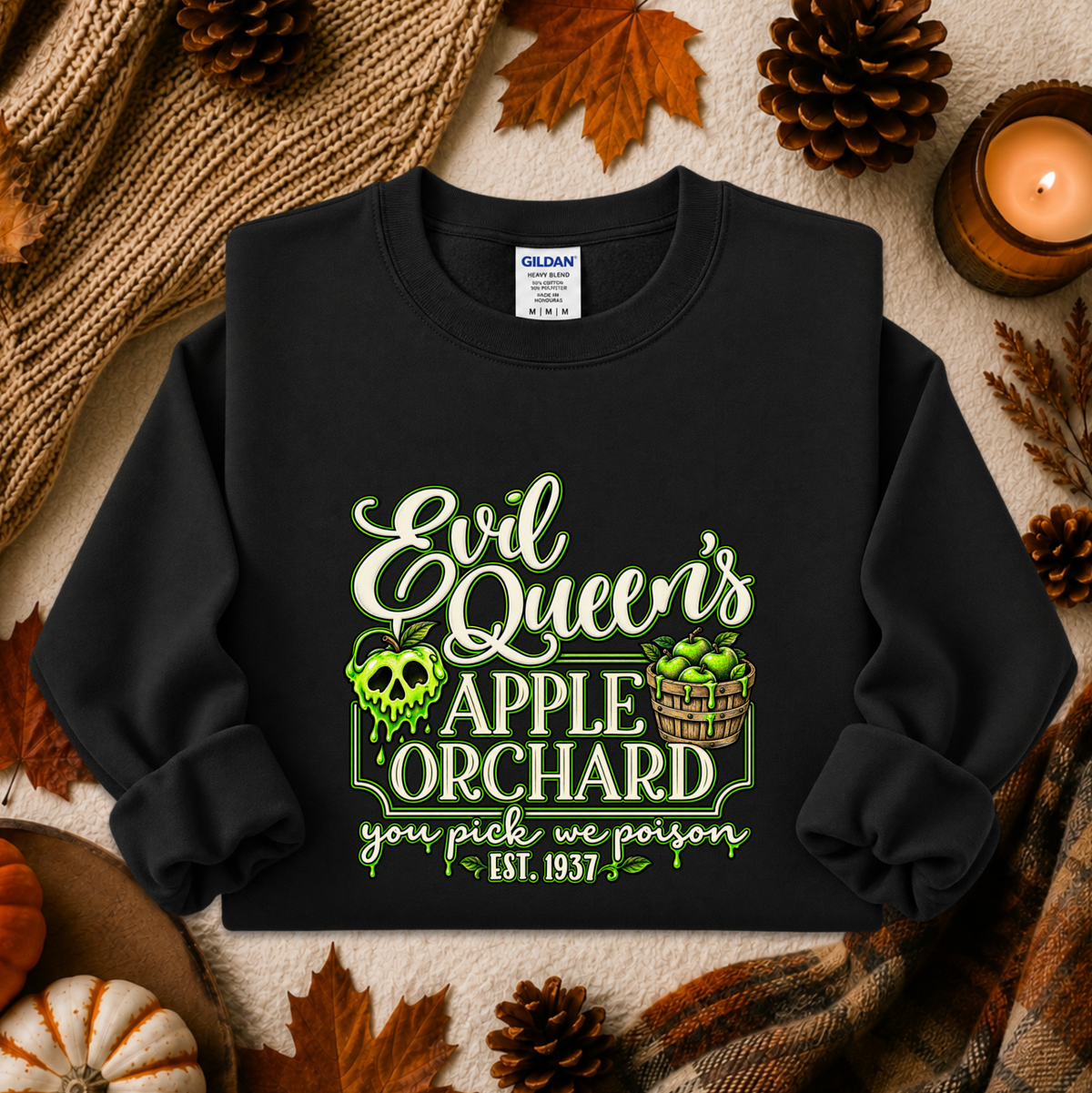 black sweatshirt with a graphic design that says evil queen's apple orchard you pick we poison on it