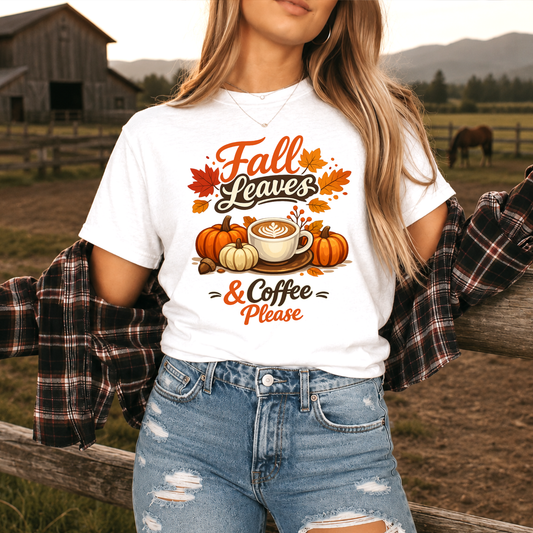 woman wearing a white tshirt with fall autumn pumpkin scene graphic design that says fall leaves and coffee please