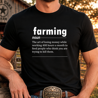man wearing a black tshirt with a graphic of funny text that gives a definition of farming