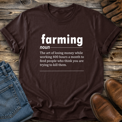 brown tshirt with a graphic of funny text that gives a definition of farming