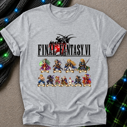 A light gray heather t-shirt featuring a graphic print of the video game Final Fantasy VI, laid flat on a textured gray surface with festive green and blue string lights in the background.