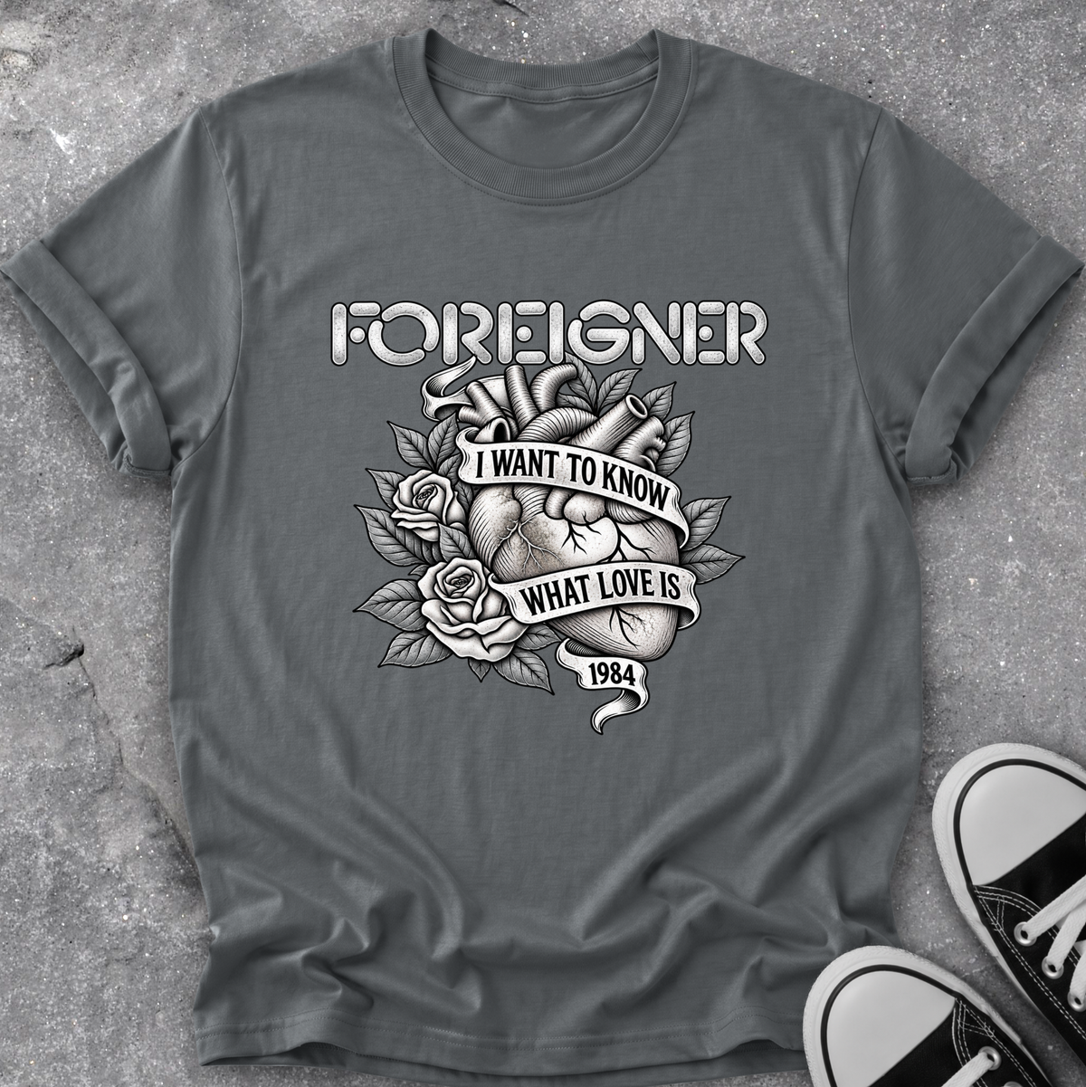 gray tshirt with a foreigner band graphic that says i want to know what love is