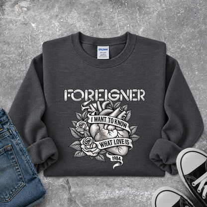 gray sweatshirt with a foreigner band graphic that says i want to know what love is