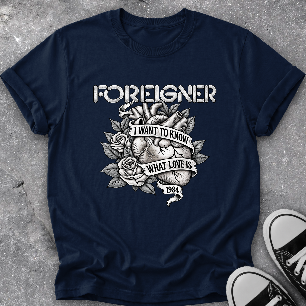 navy blue tshirt with a foreigner band graphic that says i want to know what love is