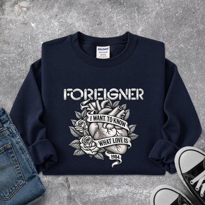 navy blue sweatshirt with a foreigner band graphic that says i want to know what love is