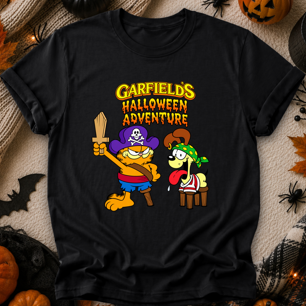 black tshirt with graphic of garfields halloween adventure on it