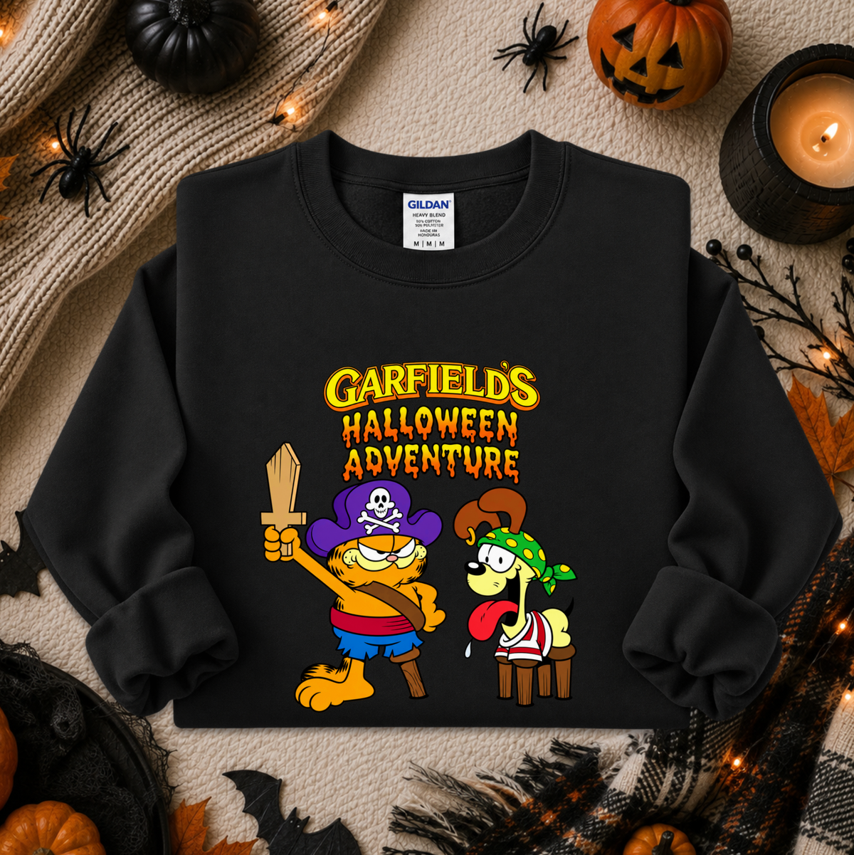 black sweatshirt with graphic of garfields halloween adventure on it
