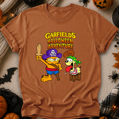 orange tshirt with graphic of garfields halloween adventure on it