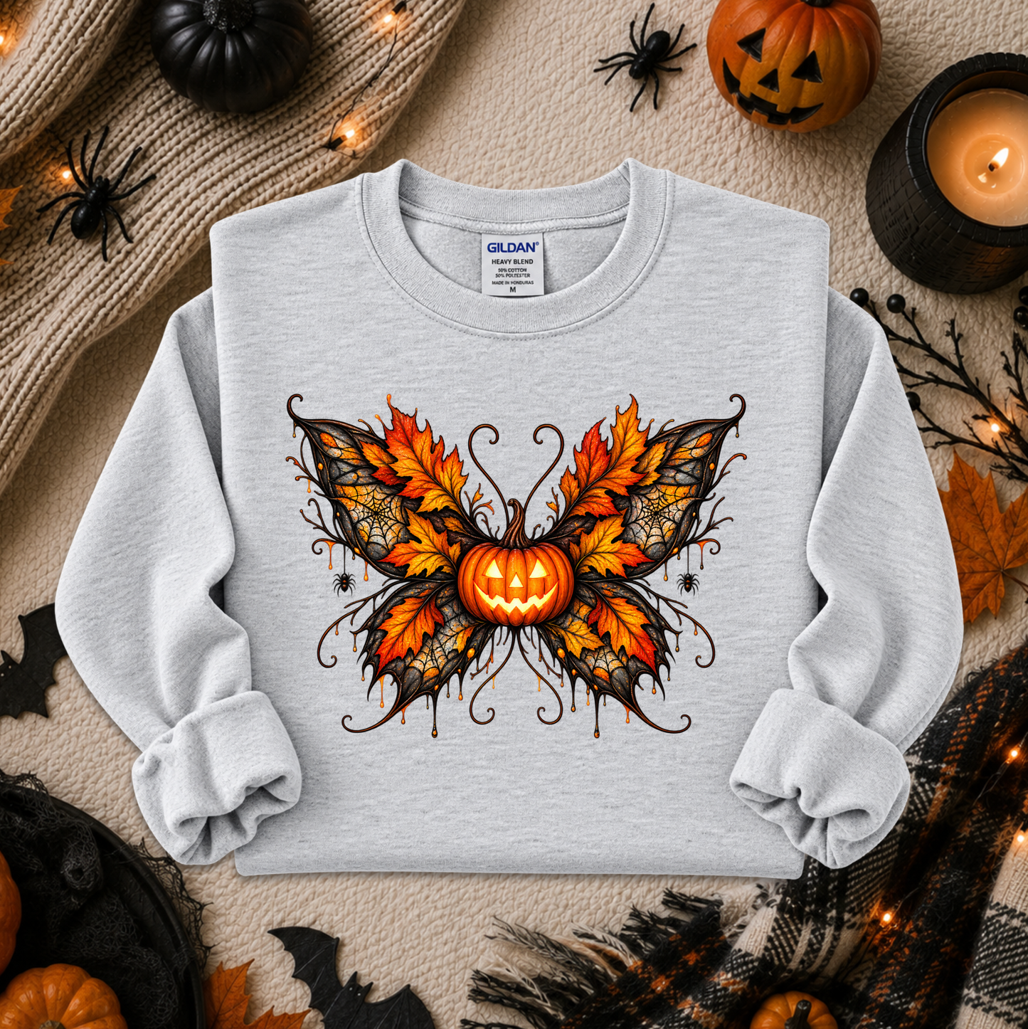 ash gray sweatshirt with a fall autumn halloween pumpkin theme graphic on it
