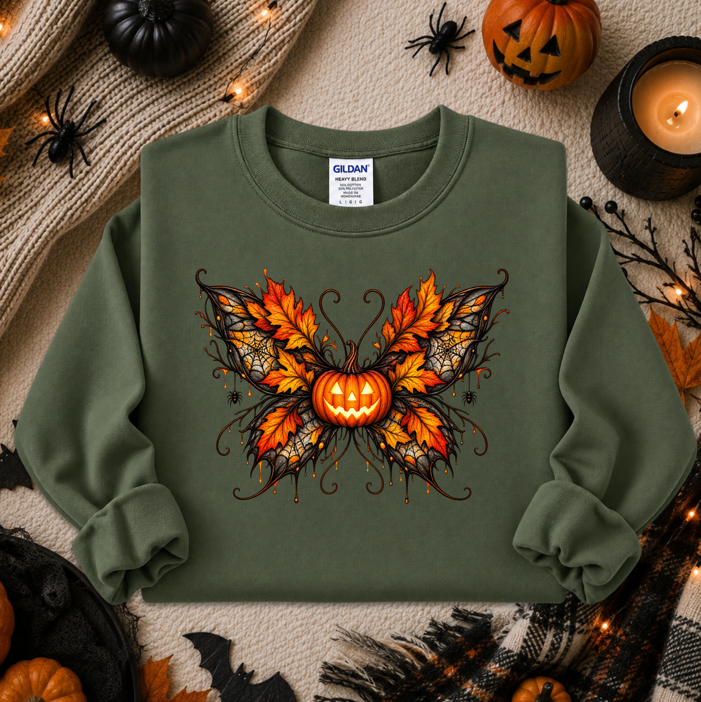 green sweatshirt with a fall autumn halloween pumpkin theme graphic on it