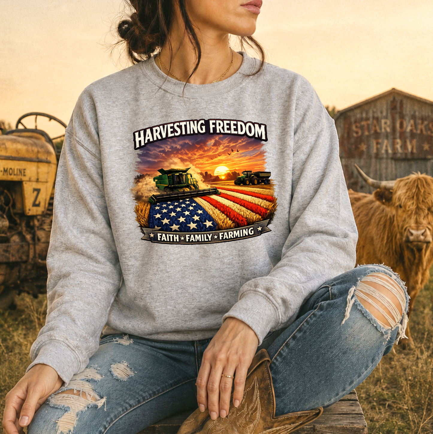 woman wearing gray sweatshirt with combine harvesting freedom crops graphic design