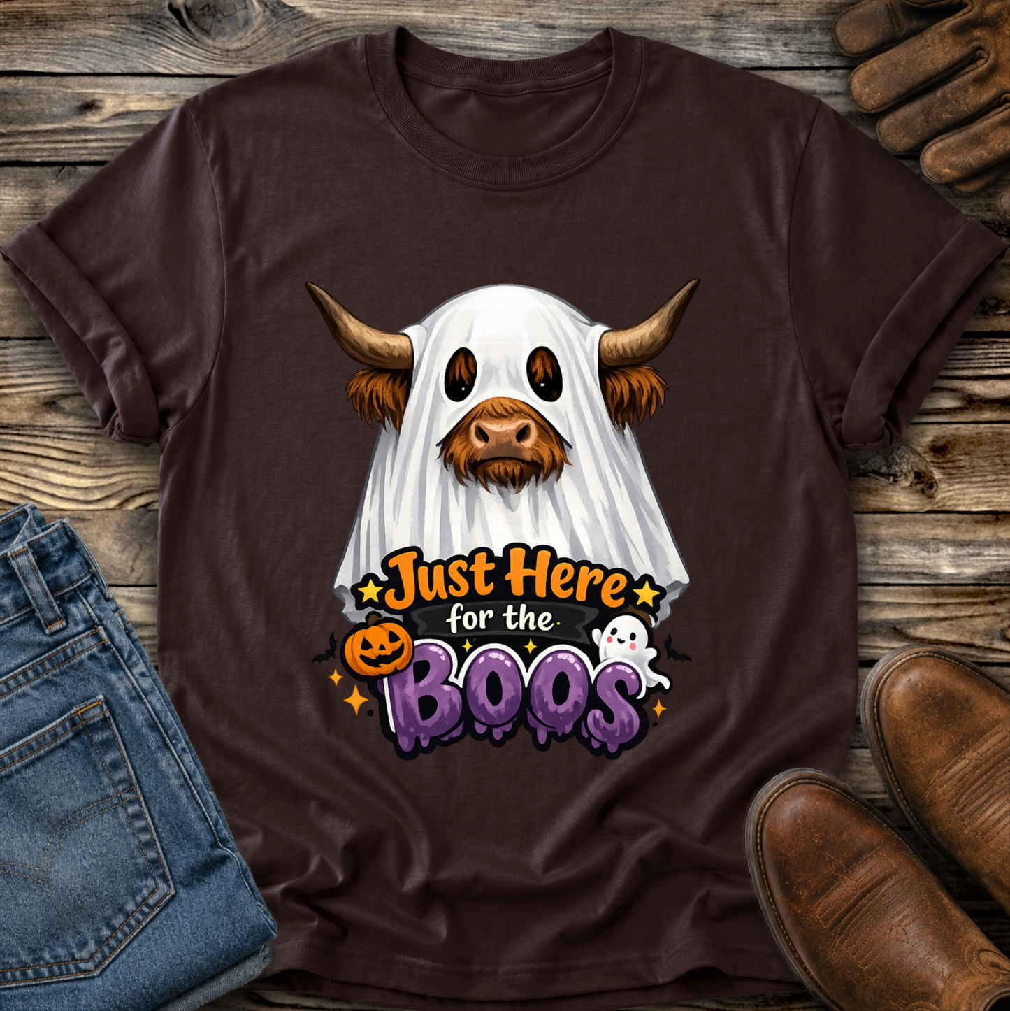 brown tshirt with a highland cow wearing a halloween ghost costume and says just here for the boos