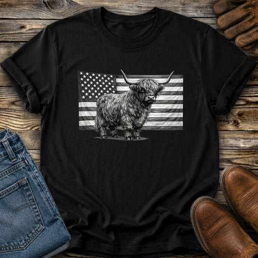 black tshirt with highland cow standing in front of USA flag graphic design