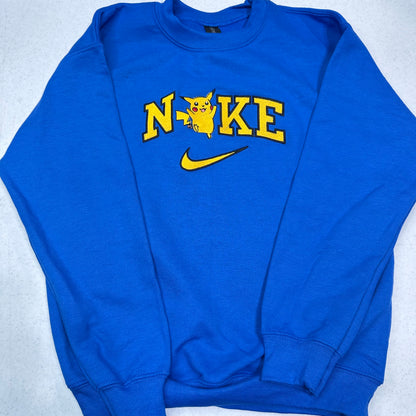 pokemon pikachu with nike logo on a blue sweatshirt