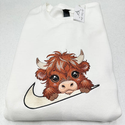 highland cow on nike swoosh