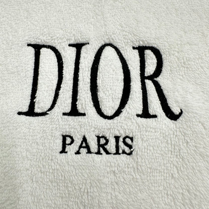 Dior logo on a textured white background
