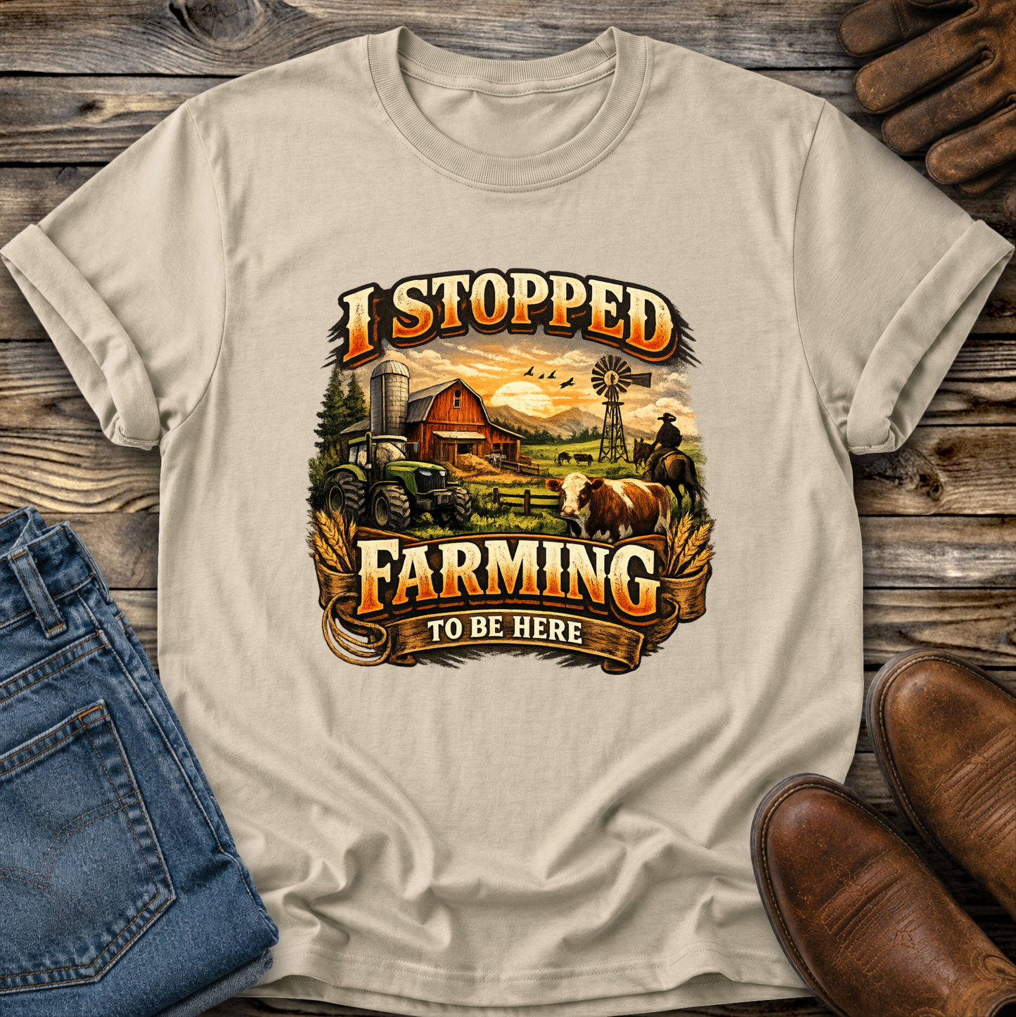 beige tshirt with farm scene graphic that says I stopped farming to be here on it