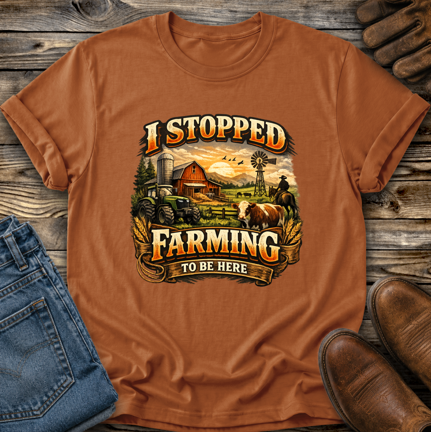 orange tshirt with farm scene graphic that says I stopped farming to be here on it