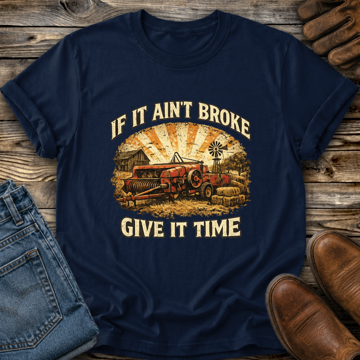 navy tshirt with farm machinery graphic that says if it aint broke give it time