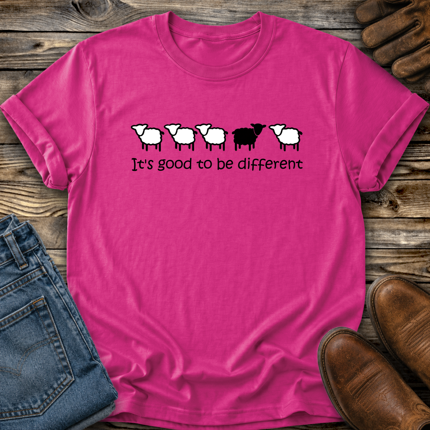 hot pink tshirt with black sheep that says its good to be different