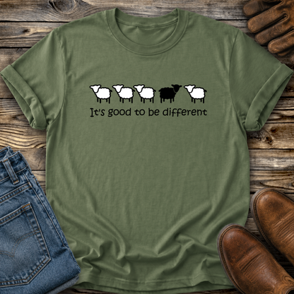 green tshirt with black sheep that says its good to be different