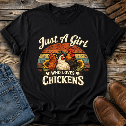 black tshirt with a retro sunset and chickens with sunflowers that says just a girl who loves chickens