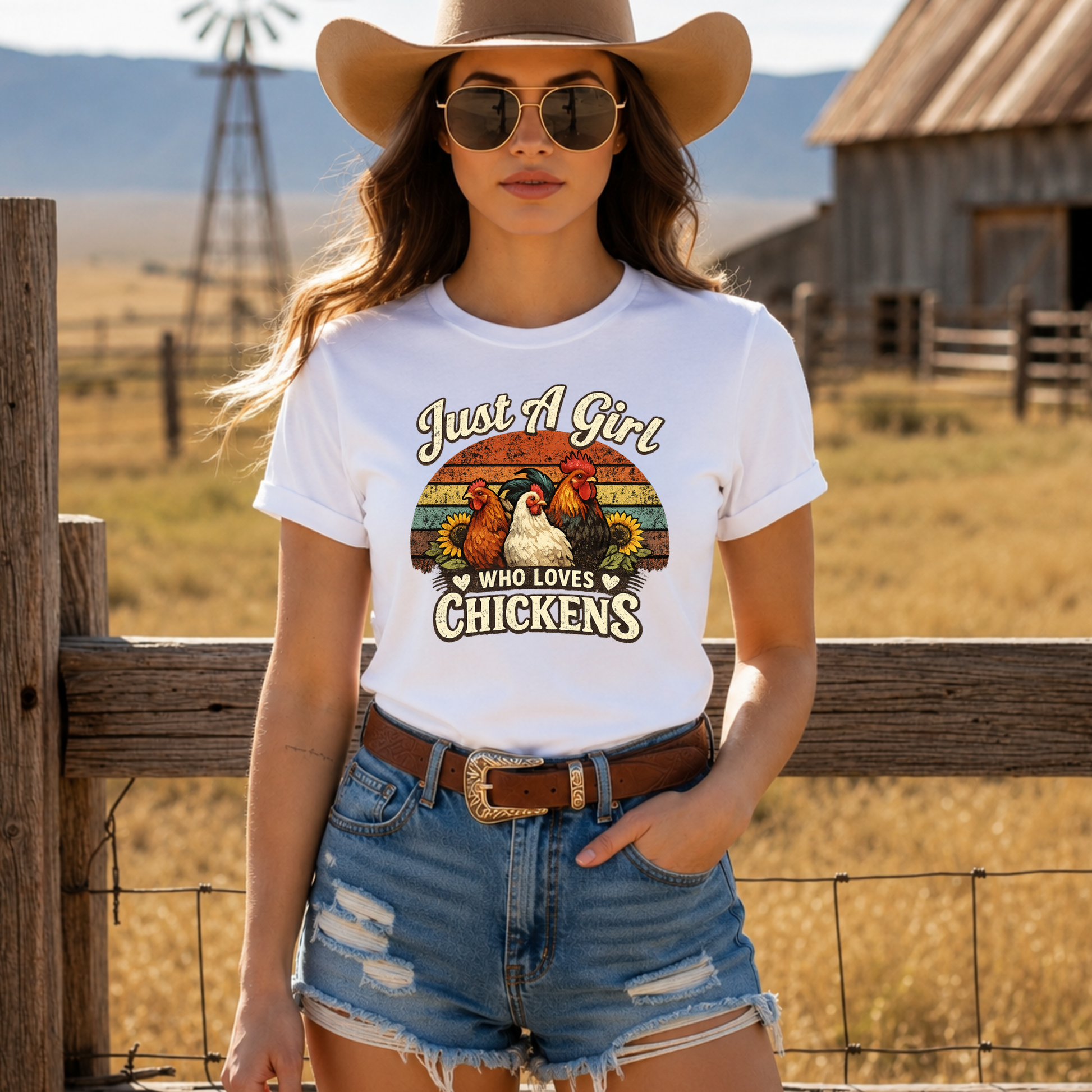 woman wearing a white tshirt with a retro sunset and chickens with sunflowers that says just a girl who loves chickens