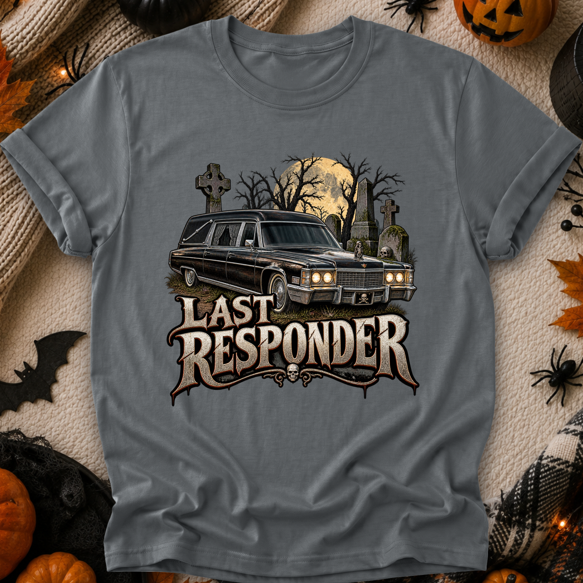 gray tshirt with a graphic design of a cemetery and hearse and it says Last Responder