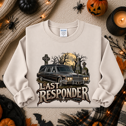 beige sweatshirt with a graphic design of a cemetery and hearse and it says Last Responder