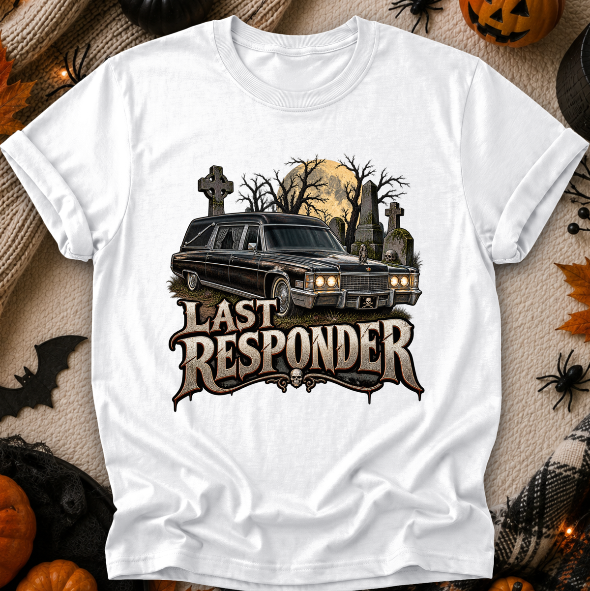white tshirt with a graphic design of a cemetery and hearse and it says Last Responder