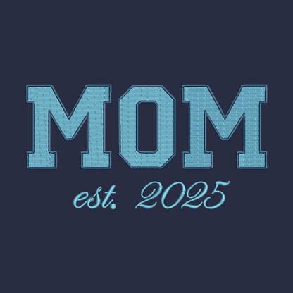 Embroidered-style text reading 'MOM est. 2025' in light blue on a dark navy background.