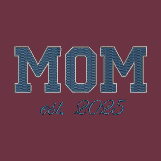 A graphic design featuring the word 'MOM' in large varsity-style block letters with a blue denim-like texture and a light outline, above the script text 'est. 2025' on a solid dark burgundy background.