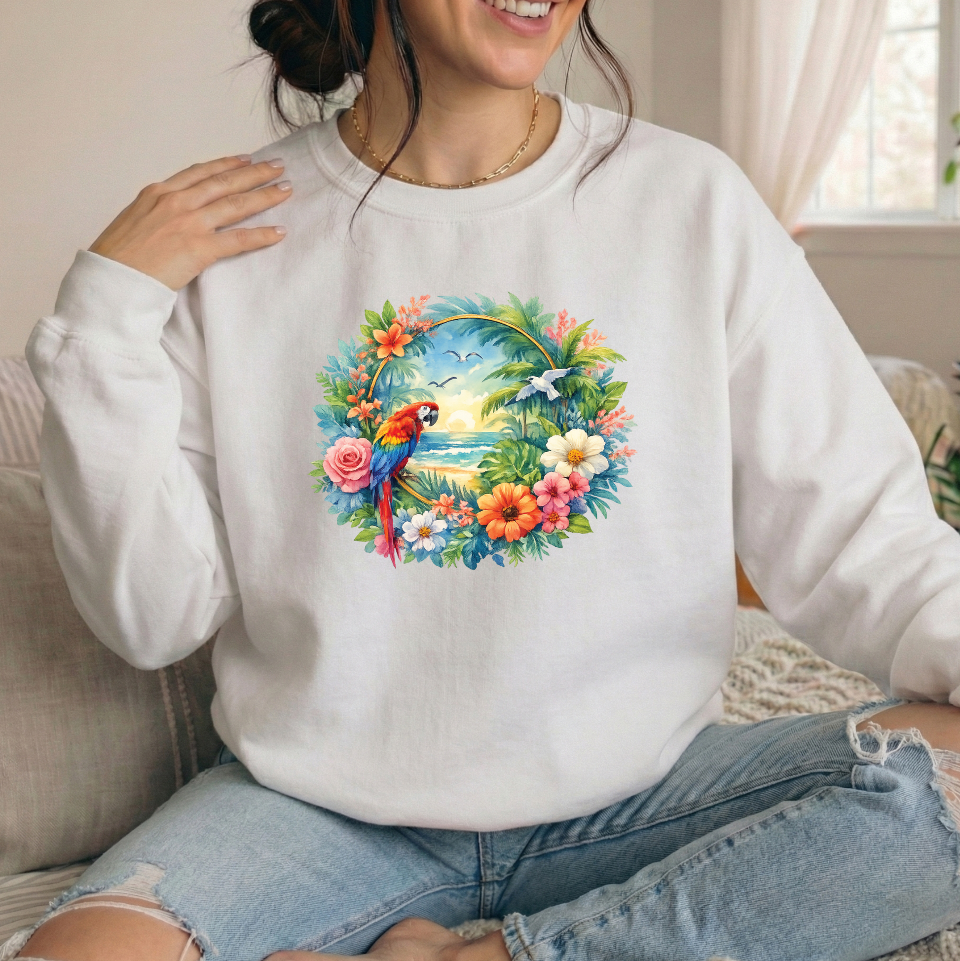 woman wearing white sweatshirt with colorful tropical watercolor parrot mackaw graphic design
