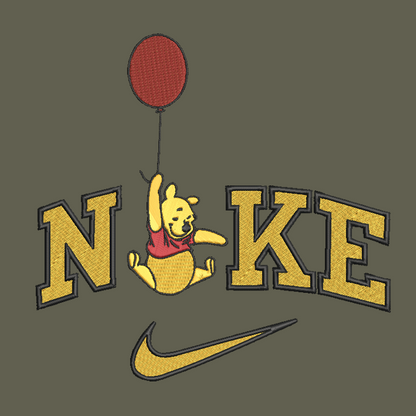 green background with embroidered design on winnie the pooh holding a balloon in the middle of the nike logo