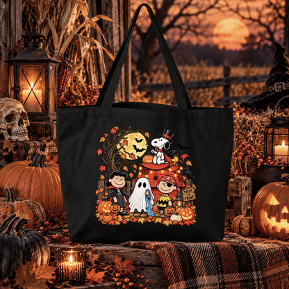 black canvas tote bag with a graphic of the peanuts gang on halloween in costumes that says trick or treat