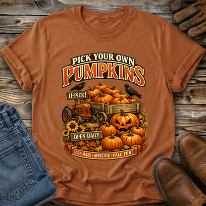 orange tshirt with a farm fall autumn scene graphic design that says pick your own pumpkins