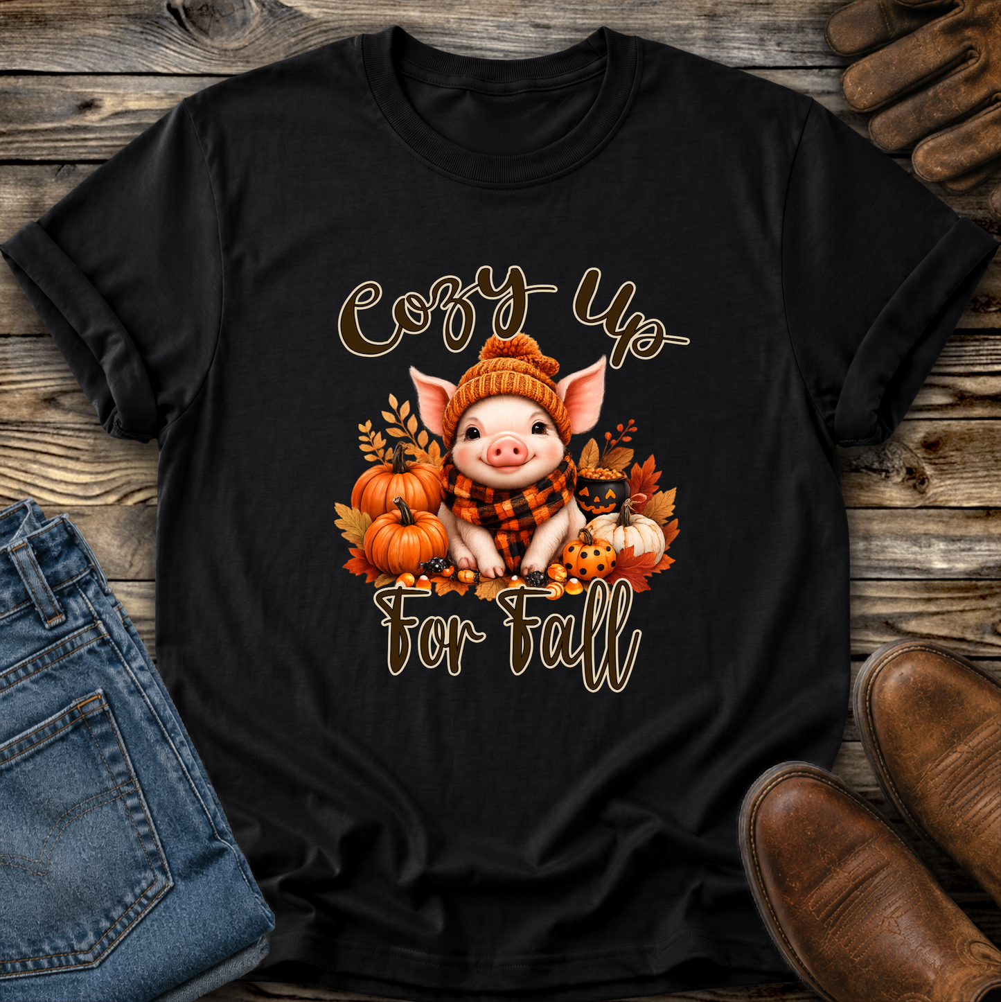 black tshirt with a pig in a scarf with fall pumpkins graphic that says cozy up for fall