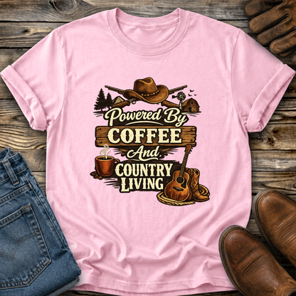 pink tshirt with country western style graphic design that says powered by coffee and country living