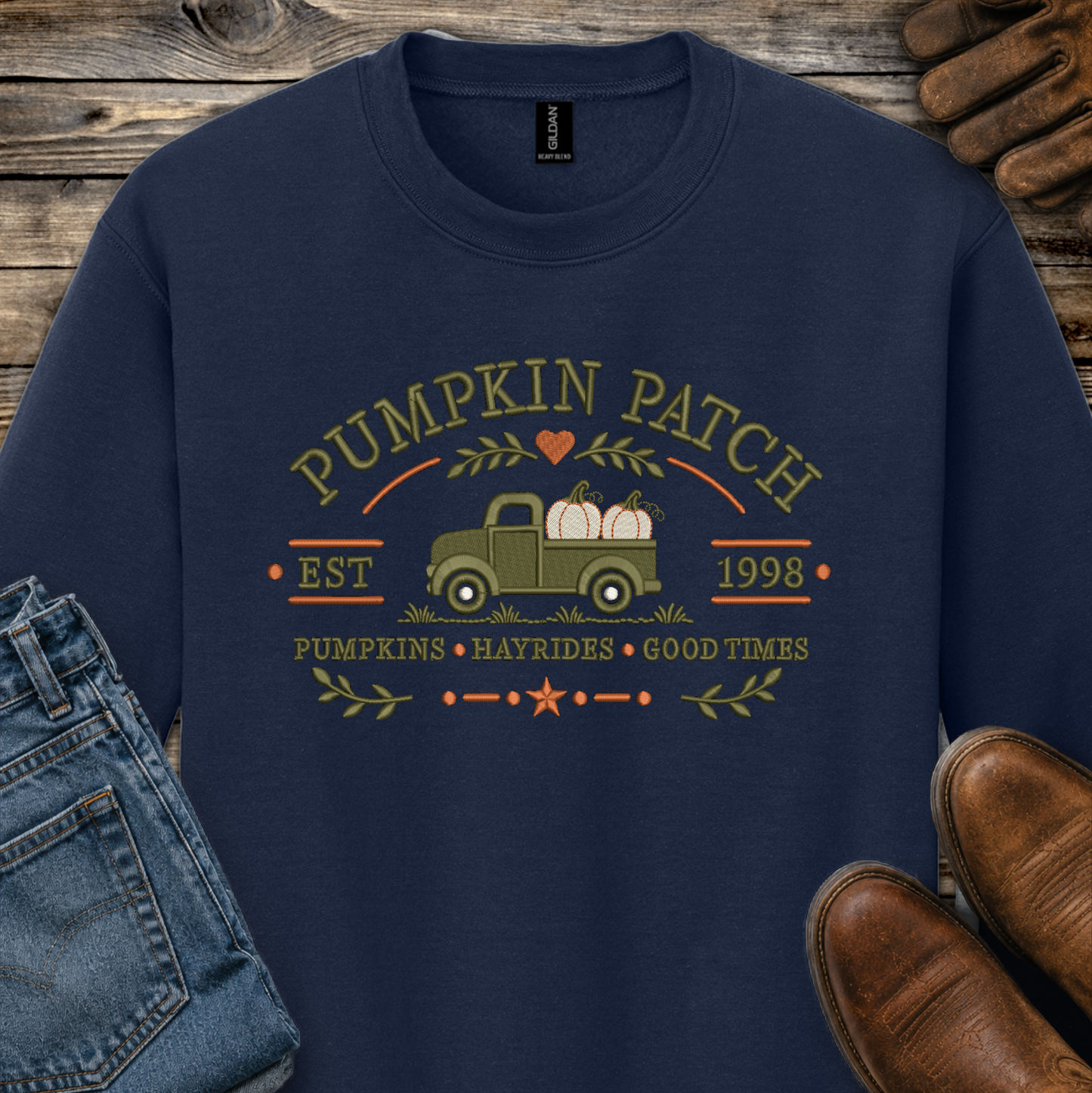 navy blue sweatshirt with embroidered old truck and pumpkins that says pumpkin patch on it