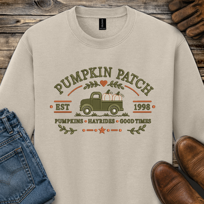 beige sweatshirt with embroidered old truck and pumpkins that says pumpkin patch on it